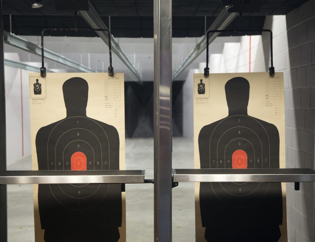 Close up of two targets at a shooting range.